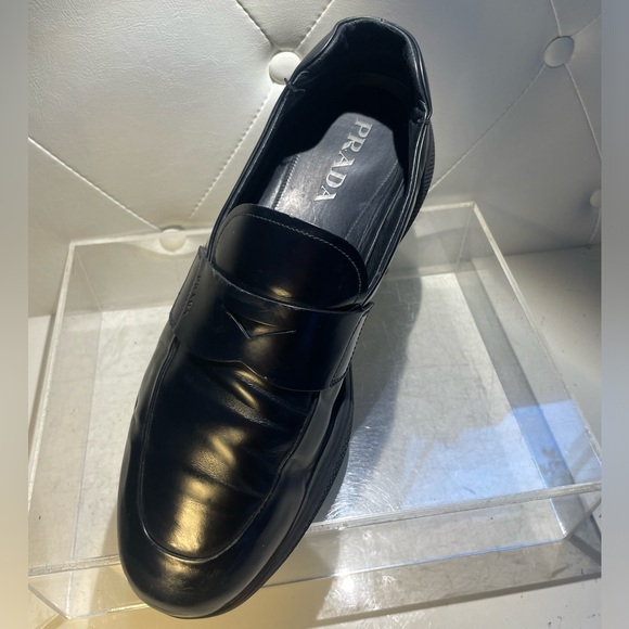 PRADA men’s spazzolato rois leather penny loafers in black sz 10.5 main image 10